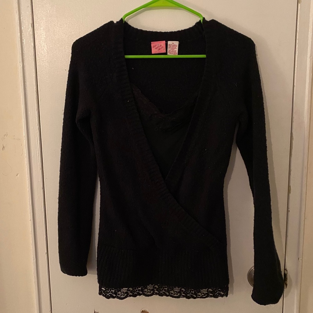 Black V-neck sweater with lace top inside